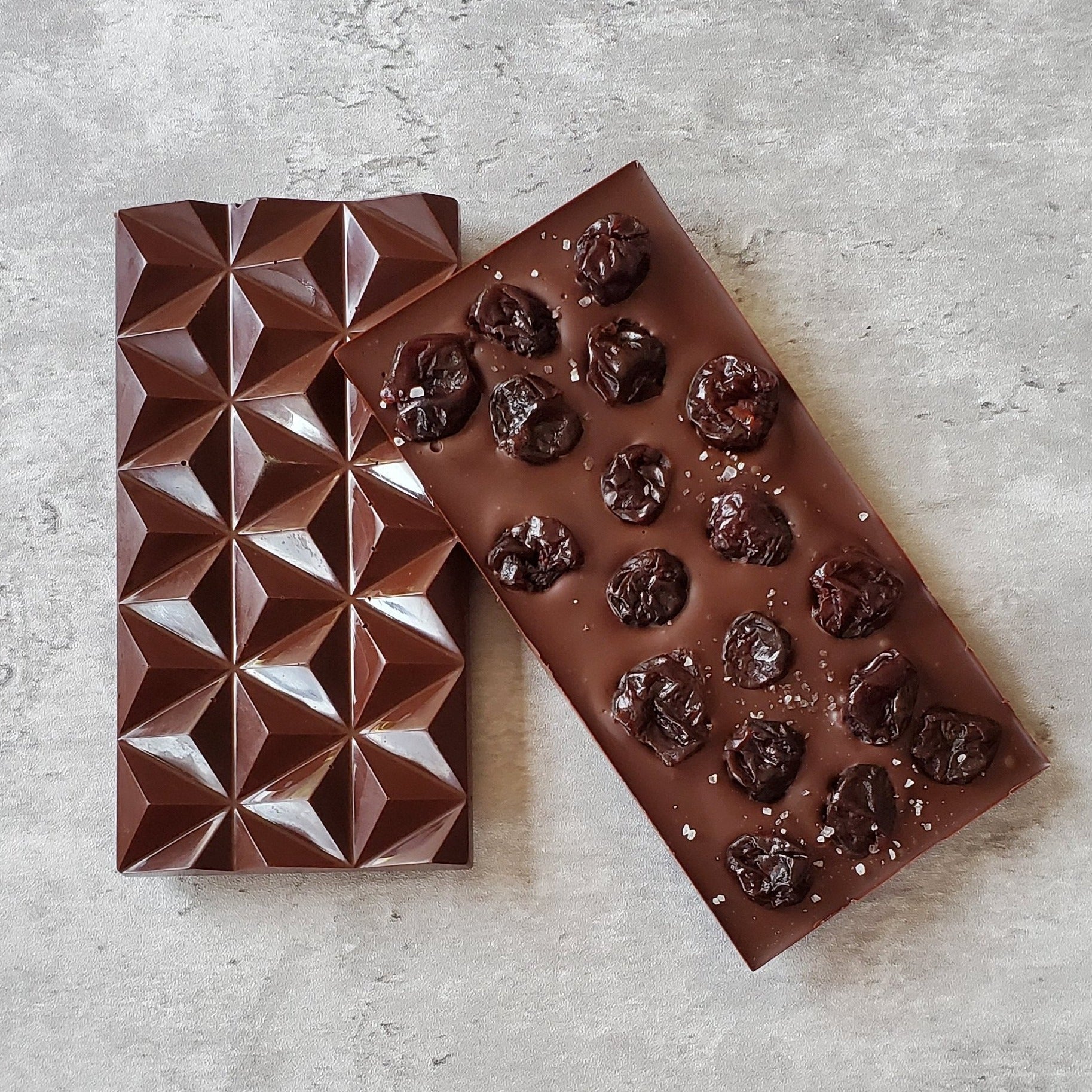Dark chocolate bar, tart dry cherries, sprinkle of fleur de sel, textured chocolate bar
